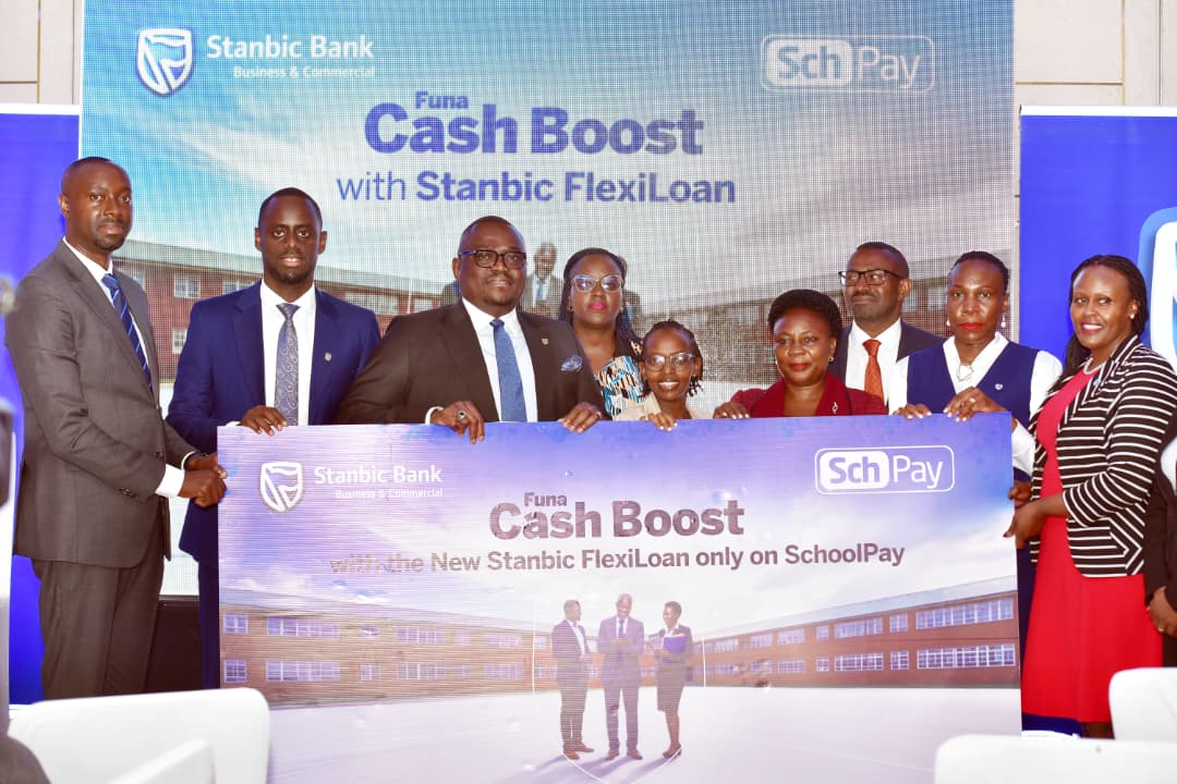 Stanbic Bank Uganda, FinCom launch digital school lending solution